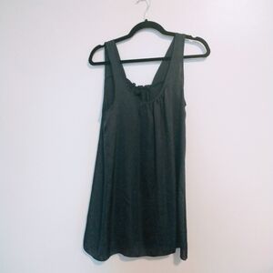 Everly long black tank top with ruffle detail in the back. Size large